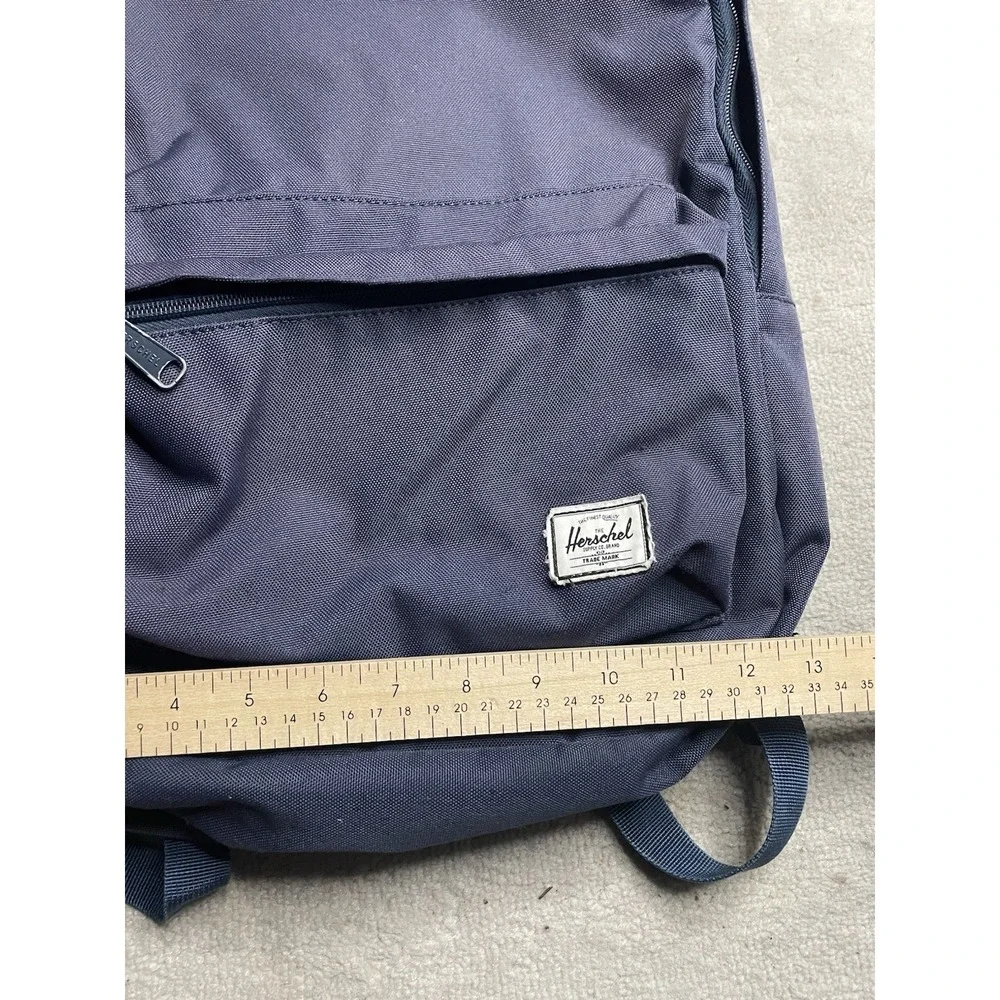 Herschel Navy Blue Backpack Zip Closure Red/White Striped Lining Pockets
